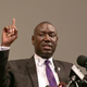 Benjamin Crump, the lawyer for Michael Brown’s family, indicates with six fingers the number of times Brown was struck by bullets from Officer Darren Wilson’s gun Aug. 9. Crump was speaking at a news conference at the Greater St. Marks Family Church on Aug. 18, 2014, in Ferguson, Mo.
Joe Raedle/Getty Images